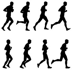 Image showing Set of silhouettes. Runners on sprint, men and woman