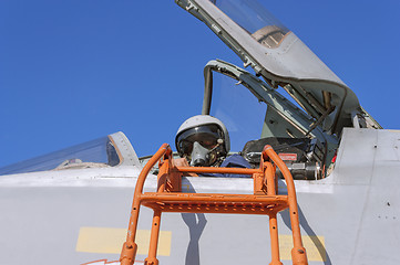 Image showing Military pilot in the cockpit of a jet aircraft