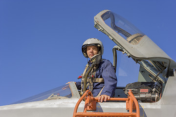 Image showing Military pilot in the cockpit of a jet aircraft