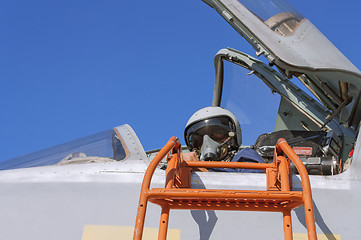 Image showing Military pilot in the cockpit of a jet aircraft