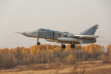 Image showing Military jet bomber Su-24 Fencer flying