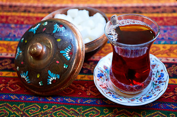 Image showing Black Turkish tea in traditional glass