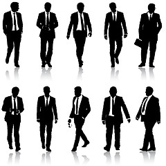 Image showing Set silhouette businessman man in suit with tie on a white background. illustration