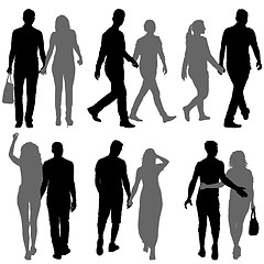 Image showing Set Silhouette man and woman walking hand in hand