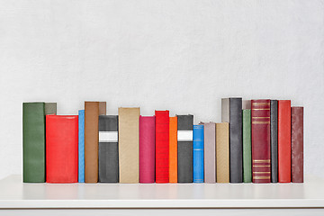 Image showing stack of books on the table