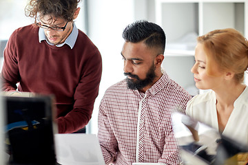 Image showing business team with papers at office