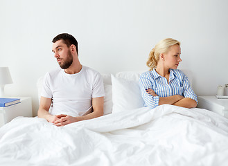 Image showing unhappy couple having conflict in bed at home