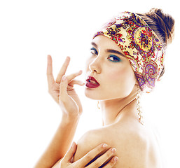 Image showing young pretty modern girl with bright shawl on head emotional posing isolated on white background, asian people ethnicity