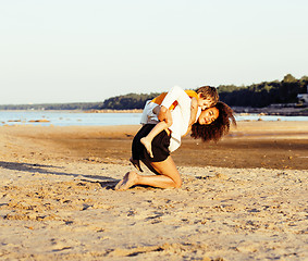 Image showing pretty diverse nation and age friends on sea coast having fun, lifestyle people concept on beach vacations close up