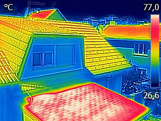 Image showing Infrared thermovision image showing Warmed roofs on family homes