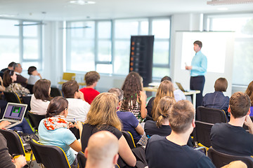 Image showing Speaker giving presentation on business conference.