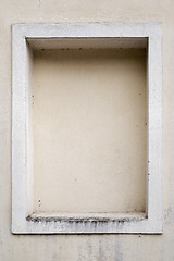 Image showing weathered stucco wall with a stucco frame