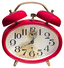 Image showing Old red alarm clock isolated on white background