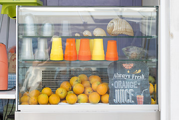 Image showing Orange juice and fruit shop