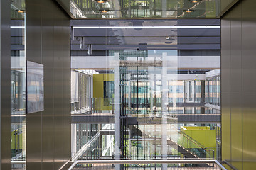 Image showing Abstract window reflections in morden office building.