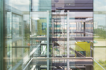 Image showing Abstract window reflections in morden office building.