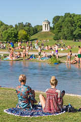 Image showing People tanning, swimming and enjoying the summer in Englischer Garten in Munich, Germany.