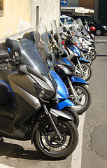 Image showing Scooters in line