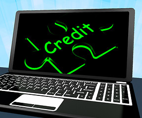 Image showing Credit Puzzle On Laptop Shows Ecommerce