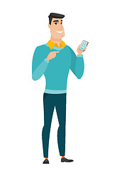 Image showing Caucasian business man holding a mobile phone.