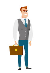 Image showing Caucasian business man holding briefcase.