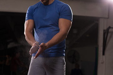 Image showing Gym Chalk Magnesium Carbonate hands clapping man