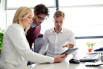 Image showing business team with tablet pc at office