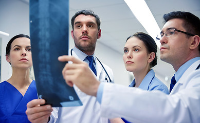 Image showing group of doctors looking at x-ray scan image