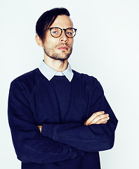 Image showing young handsome teenage hipster guy posing emotional, happy smiling against white background isolated, lifestyle people concept