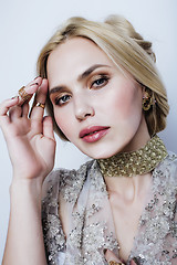 Image showing young pretty blond woman in luxury jewelry, lifestyle rich people concept 