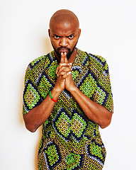 Image showing portrait of young handsome african man wearing bright green nati