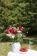 Image showing Midsummer decorated table in Sweden