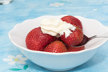 Image showing Fresh strawberries with whipped cream