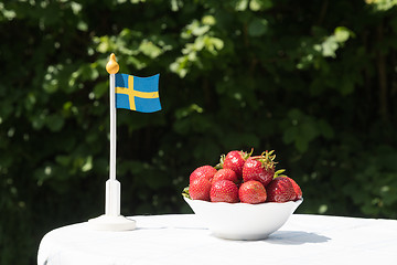 Image showing Swedish flag and strawberries