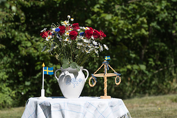 Image showing Decorated table at midsummer