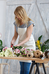 Image showing Image of blonde florist girl