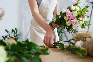 Image showing Image of woman making bouquet