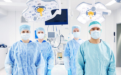 Image showing group of surgeons in operating room at hospital