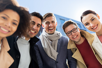 Image showing group of happy people or friends on city street