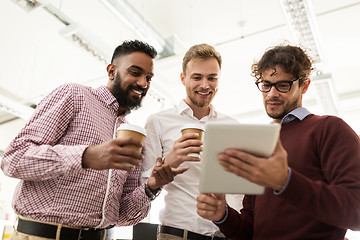 Image showing business team with tablet pc and coffee at office