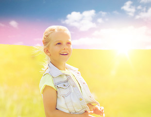 Image showing happy little girl outdoors at summer
