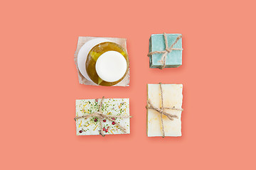 Image showing handmade soap bars over pink background