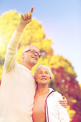 Image showing senior couple hugging in park