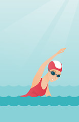 Image showing Young caucasian sportswoman swimming.