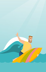 Image showing Young caucasian surfer in action on a surfboard.