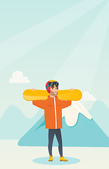 Image showing Young caucasian sportsman holding skis.