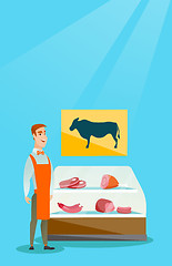 Image showing Butcher offering fresh meat in the butcher shop.