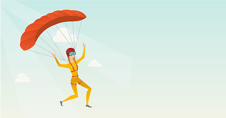 Image showing Young caucasian skydiver flying with a parachute.