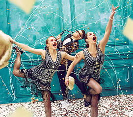 Image showing The studio shot of group of retro dancers