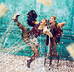 Image showing The studio shot of two female group of retro dancers